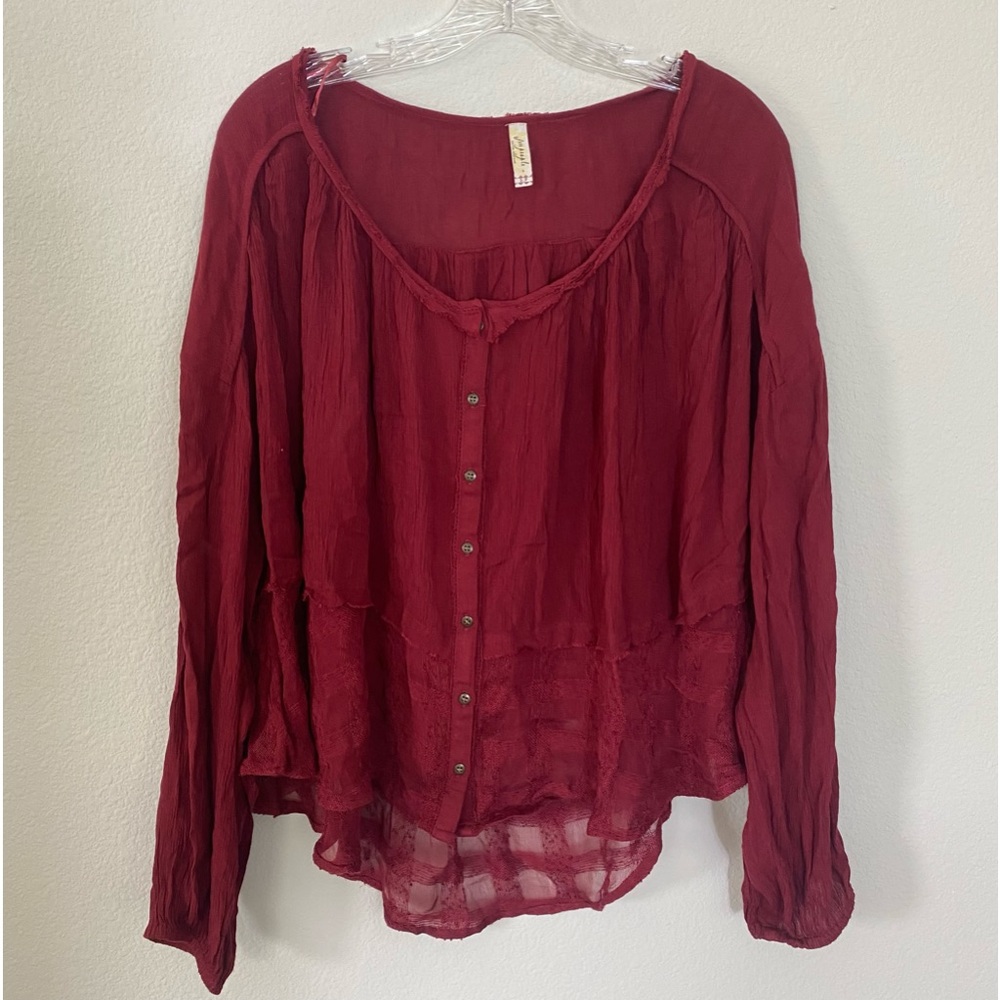 Women’s red Free People blouse size S with buttons and flowy sleeves